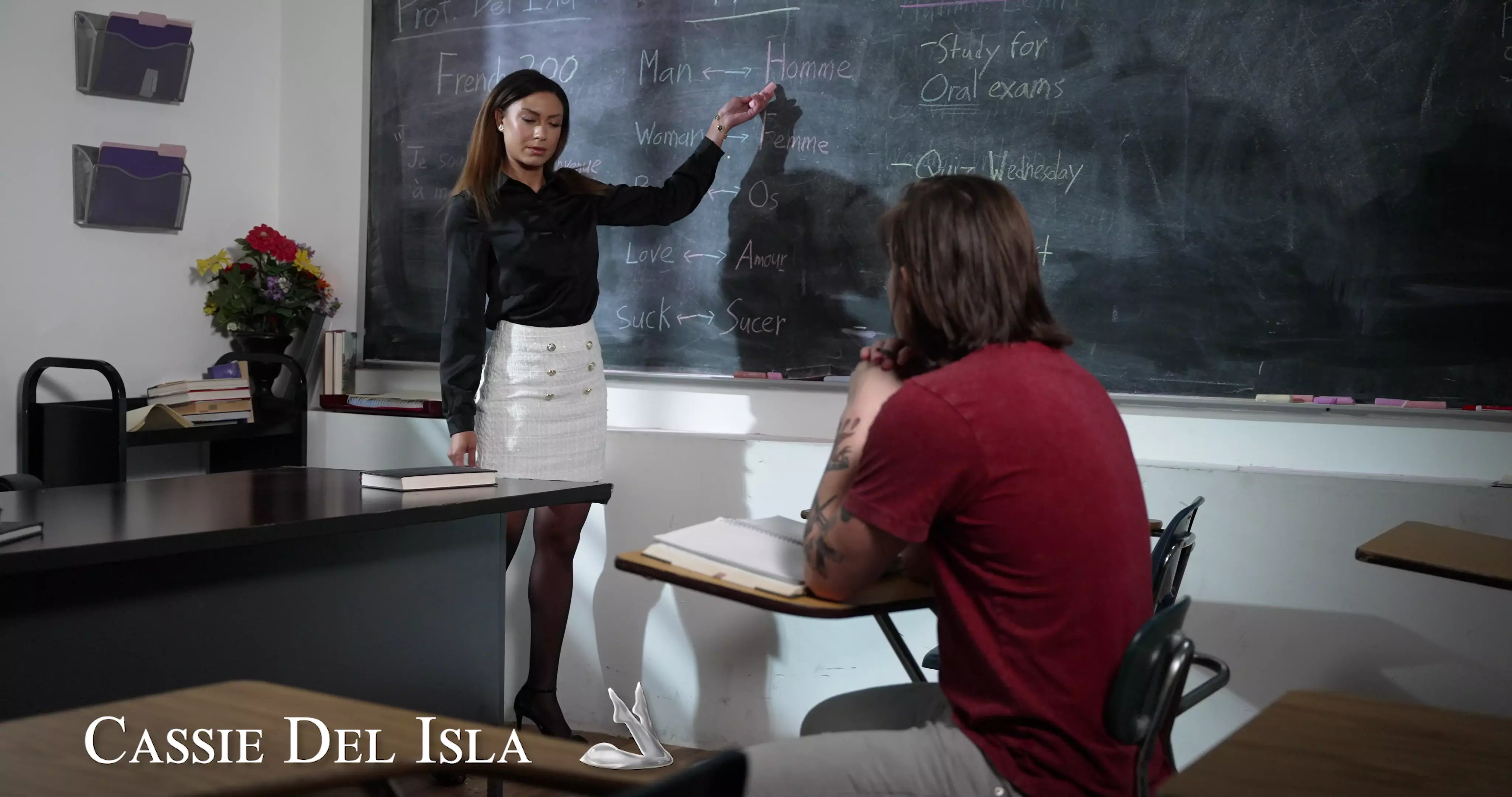 French Teacher Cassie Del Isla Strips to Help Her Student Learn thumbnail
